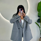 Blazer Oversize con bottone trasversale